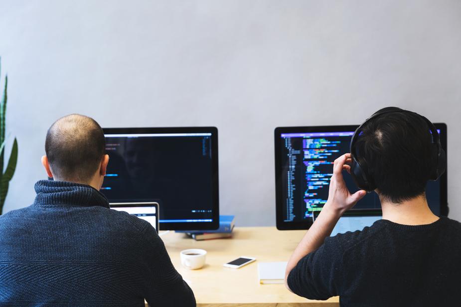 Developer team coding JavaScript